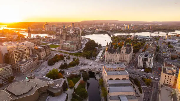 Aerial drone photograph of downtown Ottawa and Rideau Canal with Parliament Building in the background