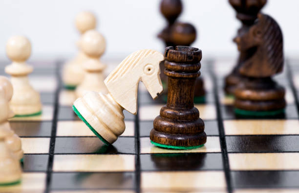 istock Chessboard background, White king against the black Rook, Making Decision and Take a Strategy, Space for Text 1345323394