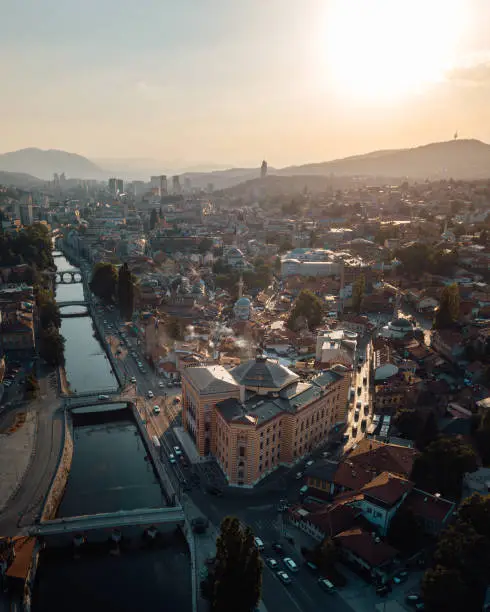 Drone view of downtown Sarajevo, city hall and river Miljacka