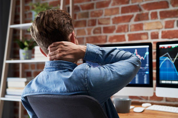 istock Working man has pain of neck 1345329815