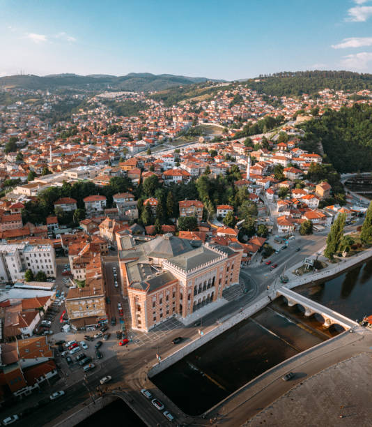 Drone view of Sarajevo city hall and river Miljacka stock photo