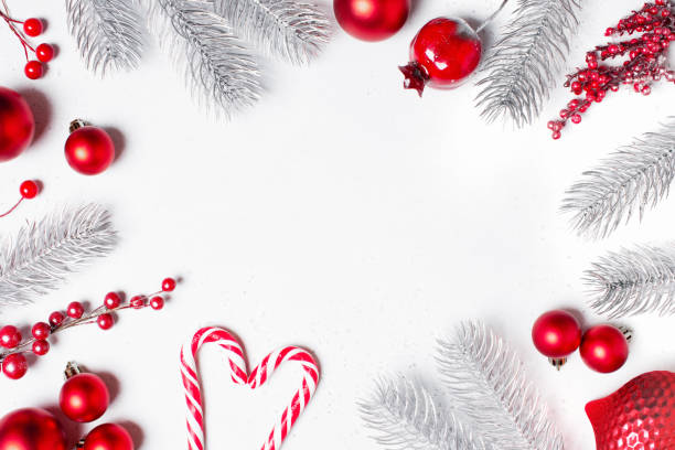 istock White Christmas background with Christmas tree branches and red decoration 1345332969