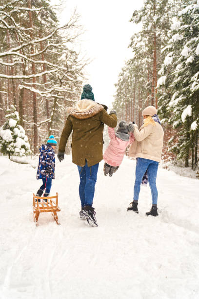 Family spending time together in winter stock photo