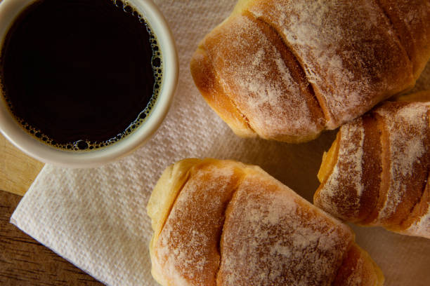 istock A cup of coffee with homemade breads. 1345333835