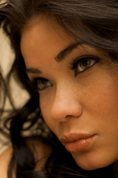 istock Asian Brunette with freckles pouting kissing looking forward 134533432