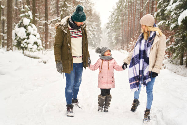 istock Family walking during the winter season 1345334804