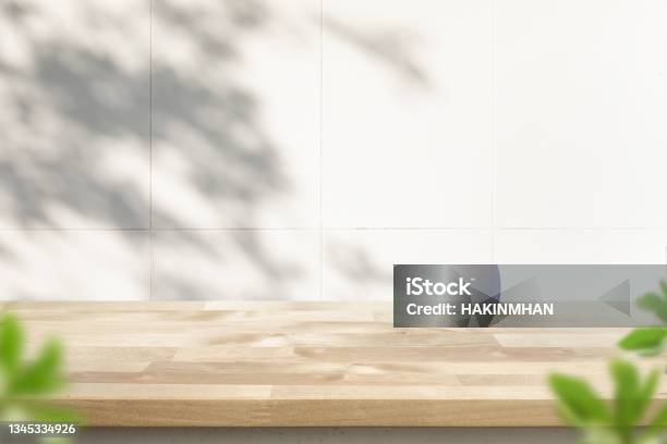 Wood Table Top On Blur Home Wall Background Stock Photo - Download Image Now - Table, Backgrounds, Wood - Material