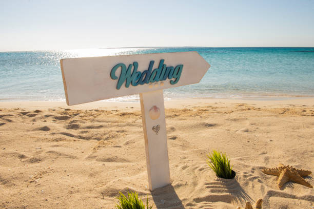 istock Wedding sign on a tropical beach paradise 1345335063