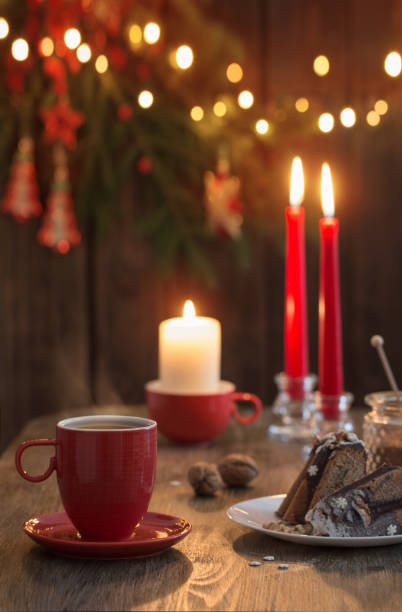 istock wooden table with Christmas cake and decor 1345336649