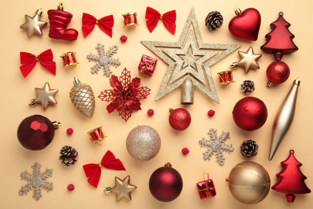istock Gold and red Christmas decoration on beige background, top view, flat lay 1345338062