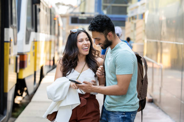 istock Young Couple commuting together while working in city 1345338385