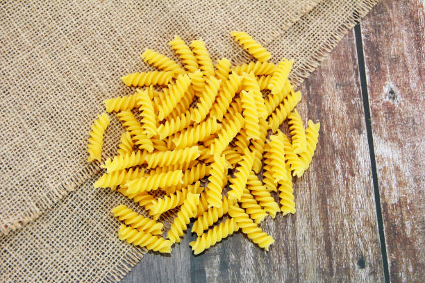 istock dry italian spiral pasta fusilli 1345338638
