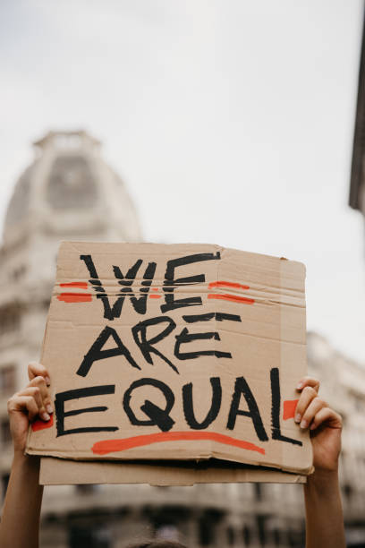 istock Close up on a group of activists holding their protesting messages 1345350366