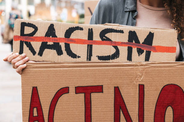 istock Close up on a group of activists holding their protesting messages 1345350850