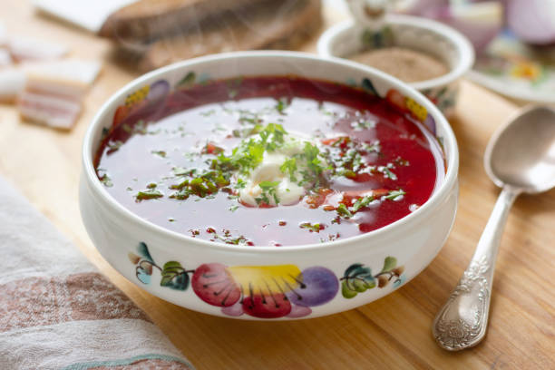 Traditional Ukrainian borscht Traditional Ukrainian borscht . Bowl of red beet root soup borsch with white cream . Beet Root delicious soup . Traditional Ukrainian food cuisine ukrainian culture stock pictures, royalty-free photos & images