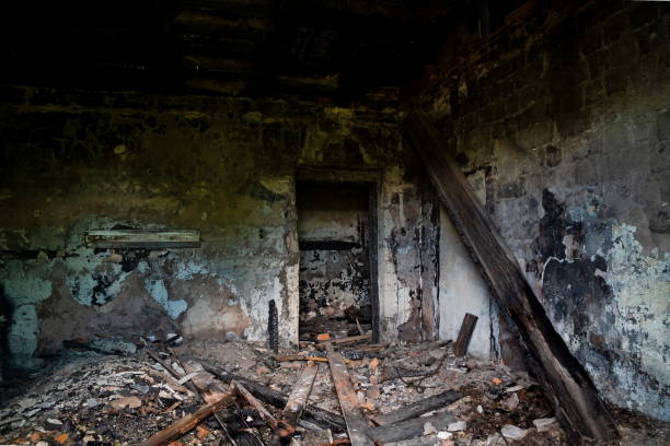Ruin of a burned house with charred beams