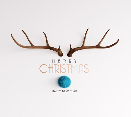 Reindeer with blue nose with Merry Christmas text on white background