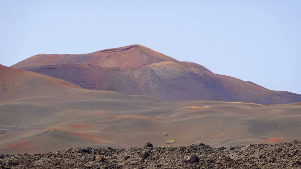 istock Volcano Scenery, Landscape with vulcan and lava 1345356073