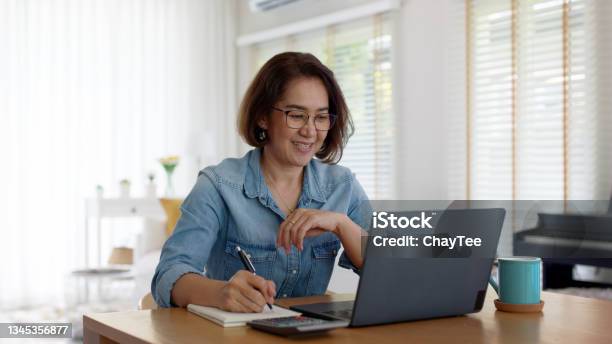 Asia Adult Happy People Or Sme Owner Latin Lady Sit Consult Talk In Online Seminar Reskill Upskill Job Discuss Class For Worker On Desk Table Work At Home In Remote Teach Advice By Digital Training Stock Photo - Download Image Now