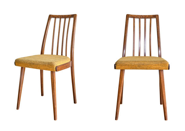 istock Mid century vintage dining chairs isolated on white background 1345357619