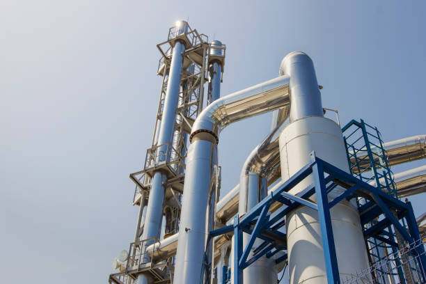 istock Process area of Petroleum plant with blue sky. 1345359719
