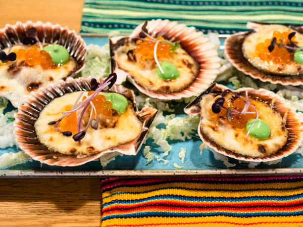 istock conchitas a la parmesana closeup Peruvian appetizer 1345359748