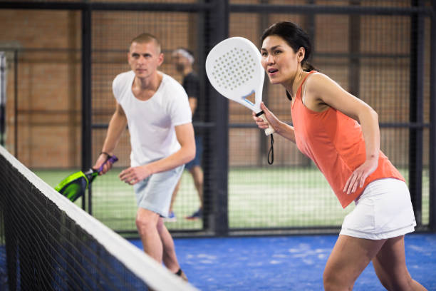 istock Beautiful asian woman playing padel 1345361213