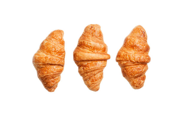 istock Three croissants isolated on a white background. 1345361635