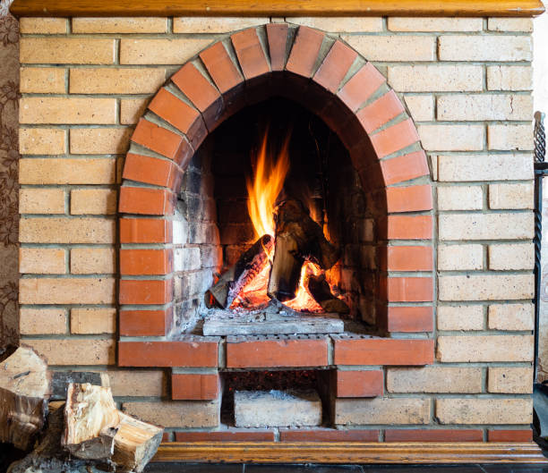 istock front view of fireplace with mantelpiece in house 1345361912