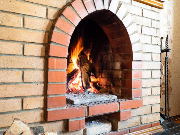 istock brick fireplace with mantelpiece in country house 1345361919