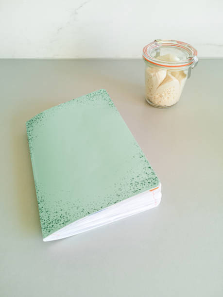 istock Italian sourdough Levito Madre and notepad on table in kitchen 1345365075