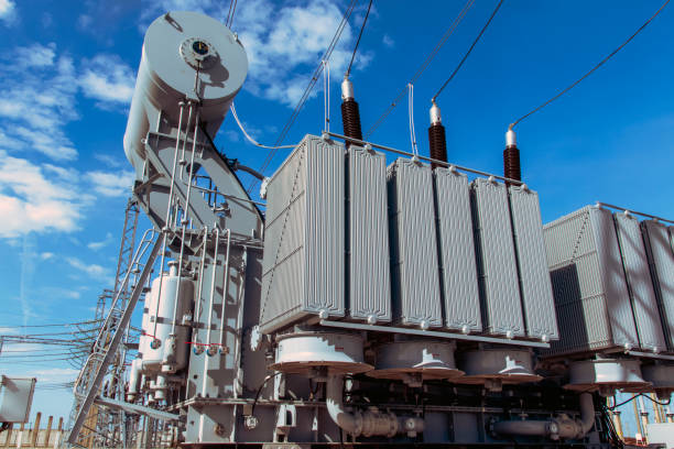 istock Powerful power transformer for industrial high voltage substation. Energy enterprise. 1345366209