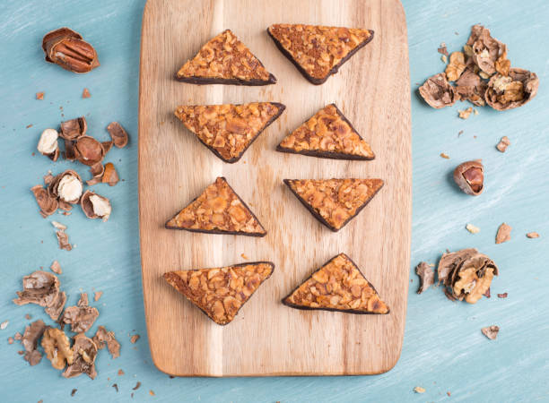 istock Nut corner, traditional german sweets called Nussecke, covered with chocolate 1345366544