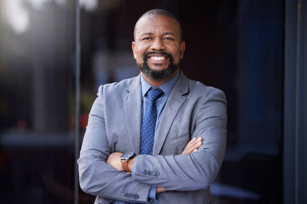 istock Shot of a businessman wearing a suit while standing outside 1345367188