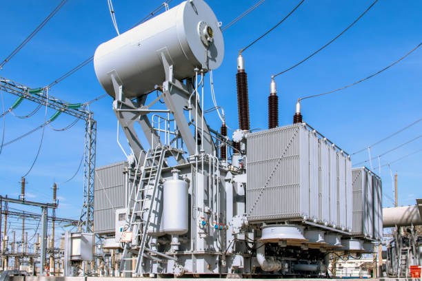 istock Powerful power transformer for industrial high voltage substation. Energy enterprise. 1345368809