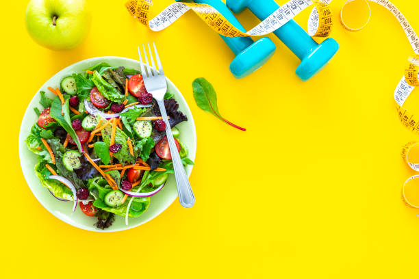 istock Healthy eating and exercising concept. Copy space 1345371347