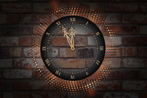 New year's clock with abstract neon lights on brick wall background.