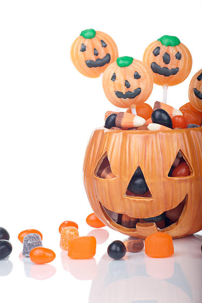 istock Halloween candy in pumpkin bowl 134537579