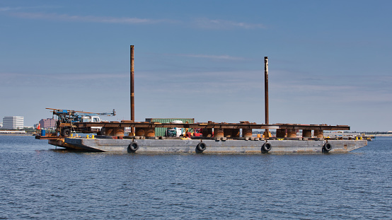 A barge in Tampa Bay at the construction site of the new Howard Frankland Bridge.