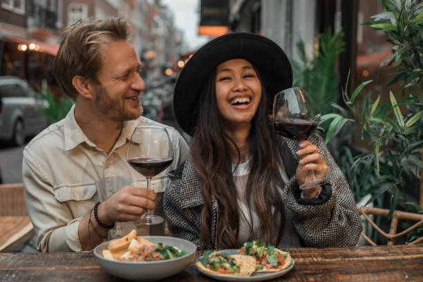 istock A couple enjoying free time in a trendy restaurant 1345378344