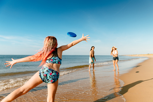 Multiracial family enjoying a day at the beach