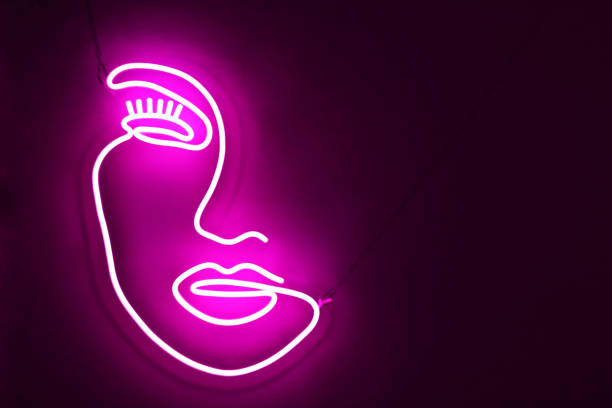 istock Pink neon sign beauty face. Trendy style. 1345379018