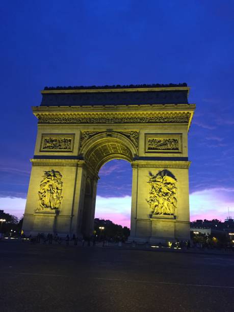 istock Arc de Triomphe with beautiful pink sunset, Paris, France 1345381221