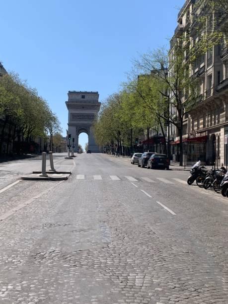 istock Arc de Triomphe with empty street during covid lockdown 2020, Paris, France 1345383350