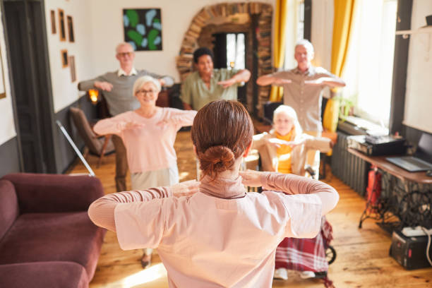 istock Morning Exercises in Retirement Home 1345383795