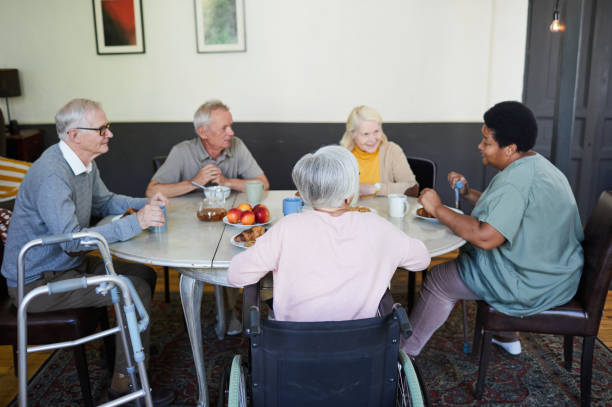 istock Group of Senior People in Nursing Home 1345383840