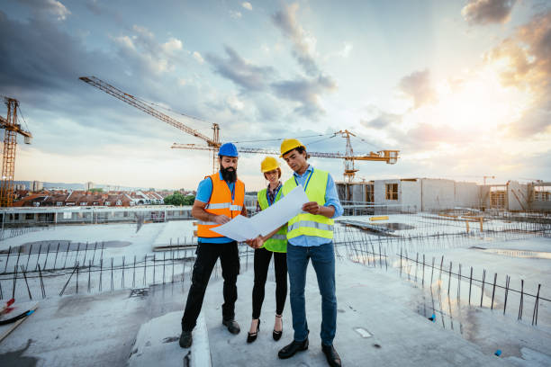 istock Engineers and architect near crane 1345385008