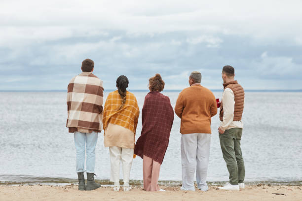 istock Friends Looking at Lake Minimal 1345385167