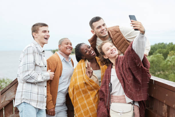 istock Friends Taking Selfie Outdoors 1345385182