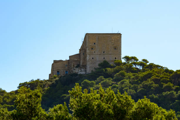 istock hermitage on the top of a hill above a Mediterranean forest 1345385289